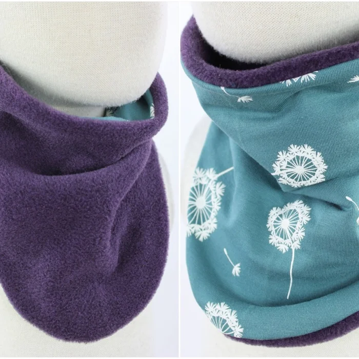 Fleece-Schlupfschal zum Wenden lila meliert mit Pusteblumen auf petrol