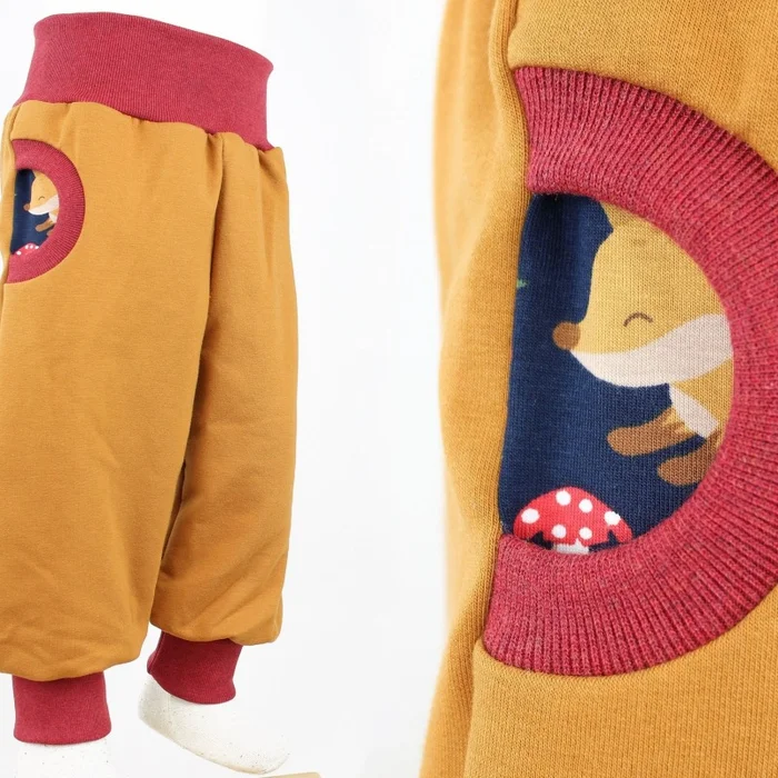 Tobehose für Kinder ocker mit Füchsen und Blumen