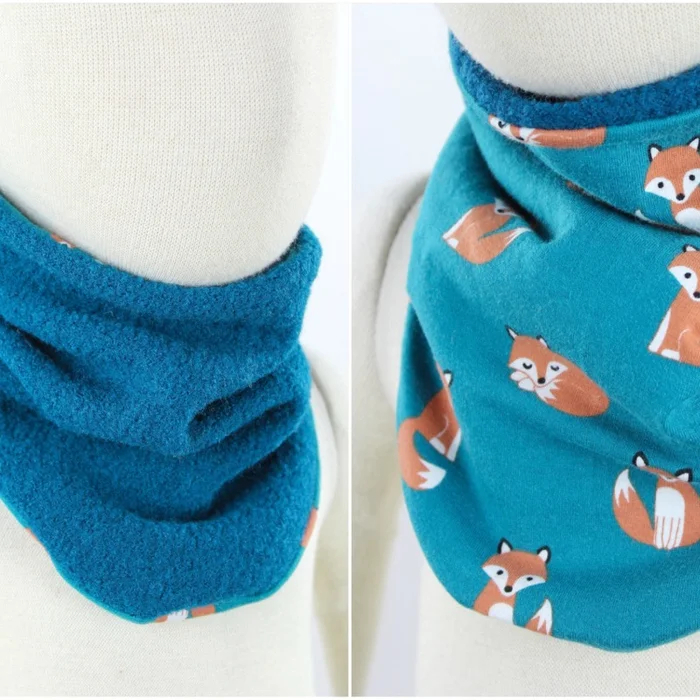 Wollschlupfschal für Kinder zum Wenden petrol mit Füchsen